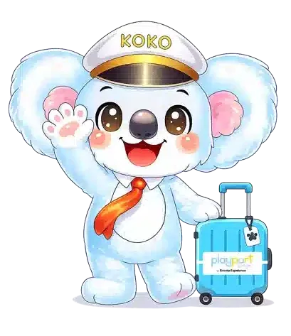 Captain Koko, the Playport Lounge mascot, a fluffy blue koala in a KOKO pilot cap and red tie, waving beside his Playport suitcase
